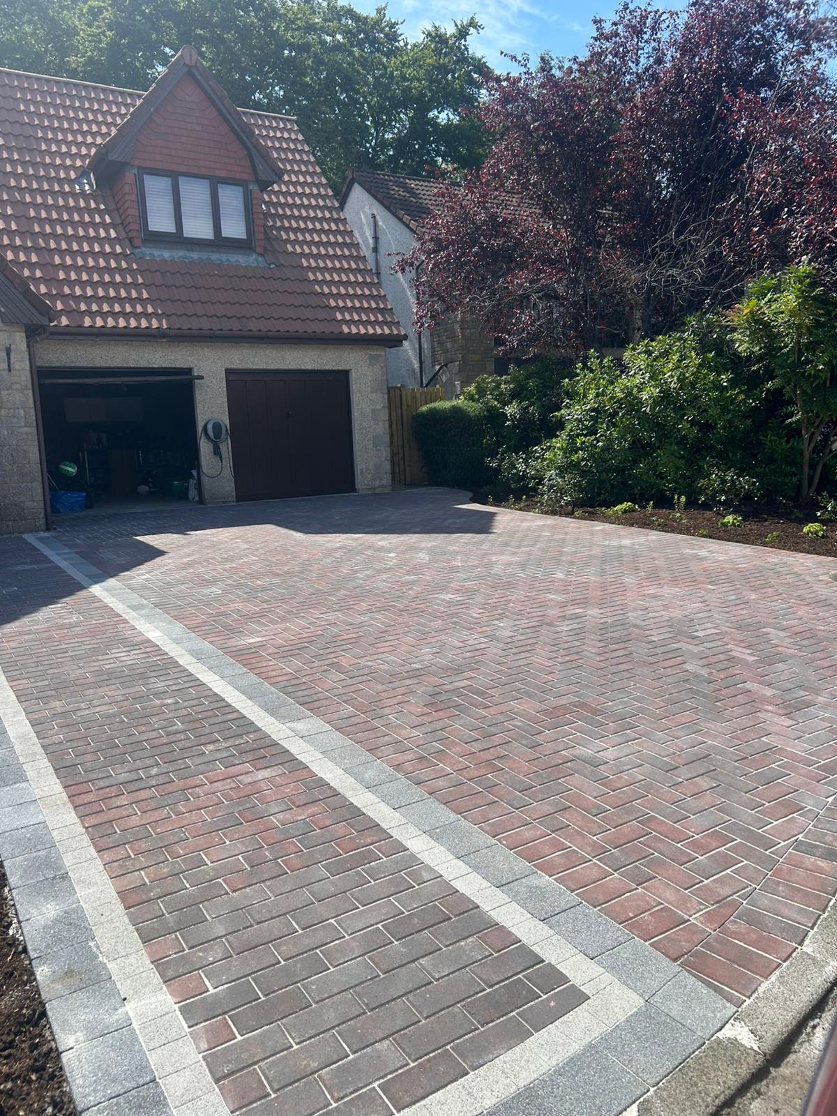 Tobermore Pedesta Bracken driveway Livingston - modern block paving installation with herringbone pattern in bracken tones